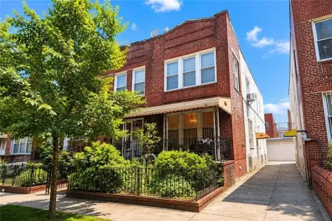 Brick Duplex With Detached Garage