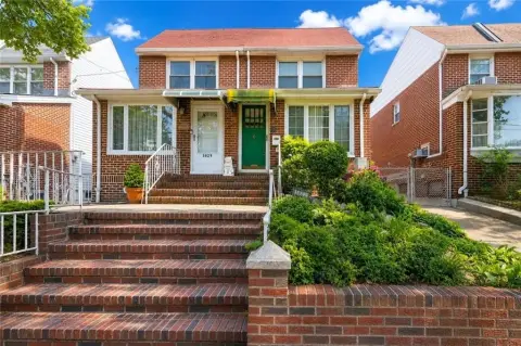 Brick Duplex with Detached Garage