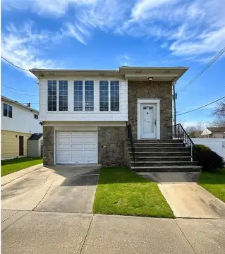 Two-Family Corner Home with Garage