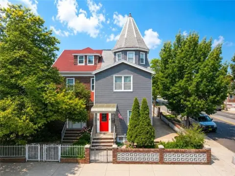 Two-Family Corner Home with Garages