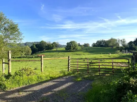Fenced Farm with Stocked Pond