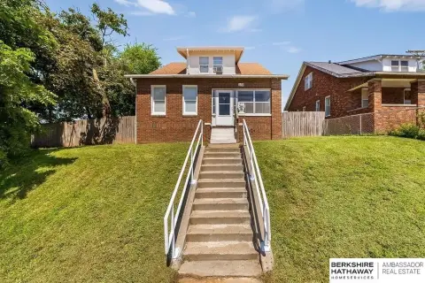 Brick Triplex With Detached Garage