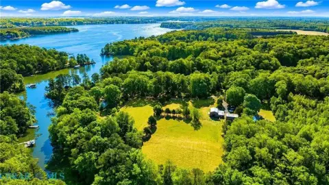 Waterfront Acreage with Renovated Stable