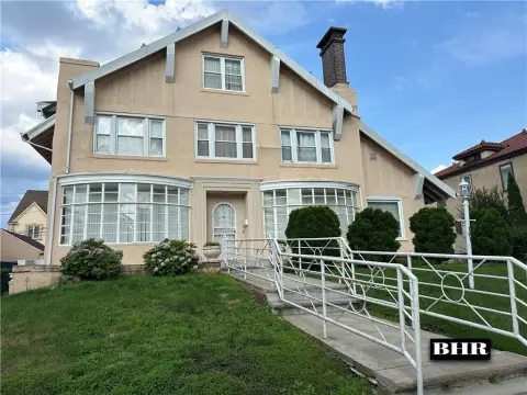 Detached Three-Family Residence with Garage