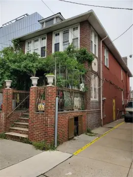 Detached Corner Two-Family Brick
