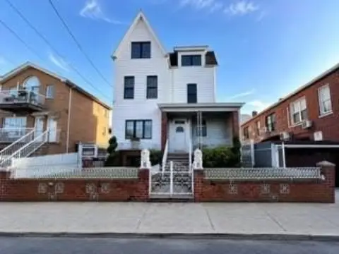 Detached Three-Family Home with Driveway