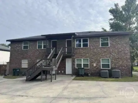 Brick Quadplex with Covered Porches