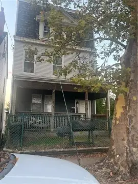 Duplex With Detached Garage