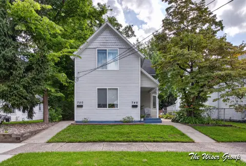 Duplex With Paved Driveway