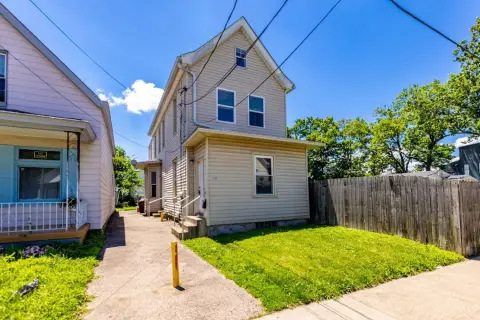 Duplex with Efficiency Outbuilding