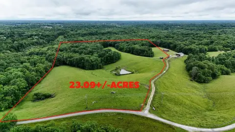 Versatile Acreage with Fishing Pond