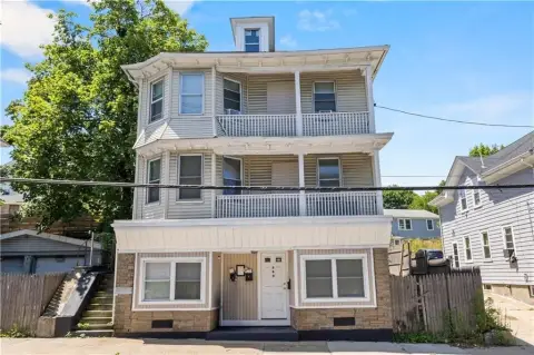 Updated Triplex with Rear Lot