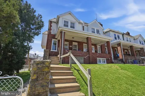 Tudor Duplex with Attached Garage