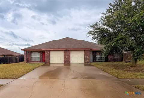 Well-Maintained Duplex with Garages