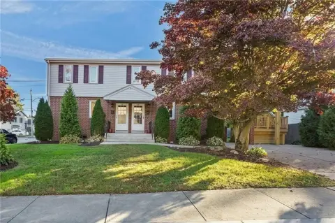 Triplex with Six-Car Garage
