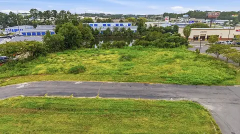 Commercial Land with Strip Center Plans