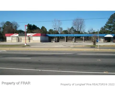 Former Gas Station with 6-Bay Wash