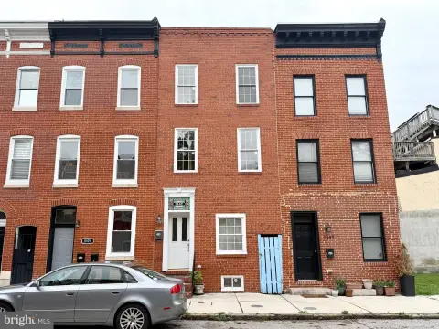 Three-Unit Townhome with Carriage House