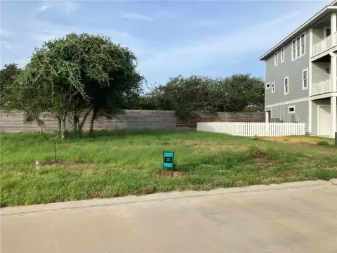 Level Waterfront Lot with HOA Amenities