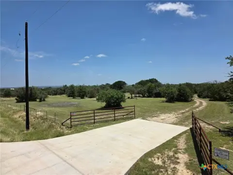 Gently Sloped Fenced Ranch Land