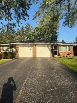 Brick Duplex with Attached Garages