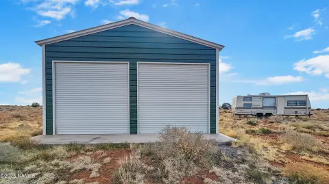 Land with Metal Building