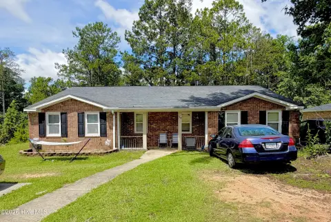 Well-Maintained Duplex with Patios
