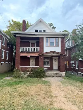 Brick Triplex with Rental Units