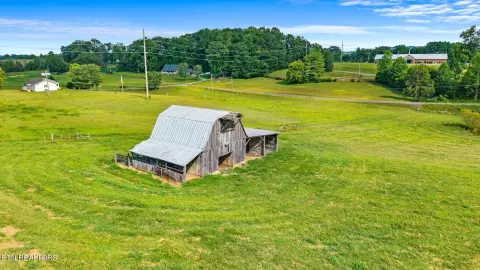 Versatile Land with Barn and Pond