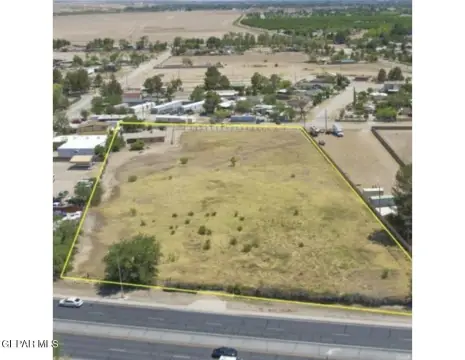 Commercial Land with Single-Family Home