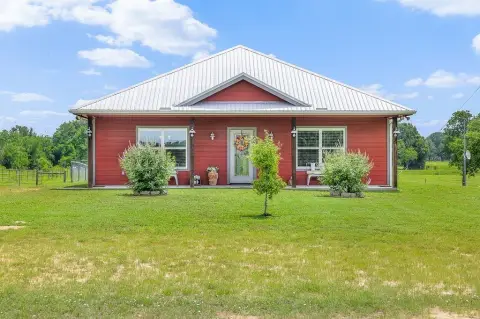 Lexington Farmhouse on Wooded Acreage