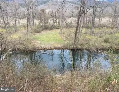 Unrestricted Land with Pond