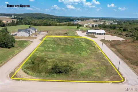 Commercial Land with Three-Side Road Frontage
