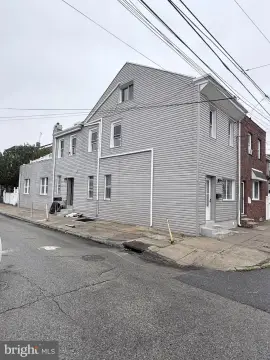 Legal Triplex with Finished Basement