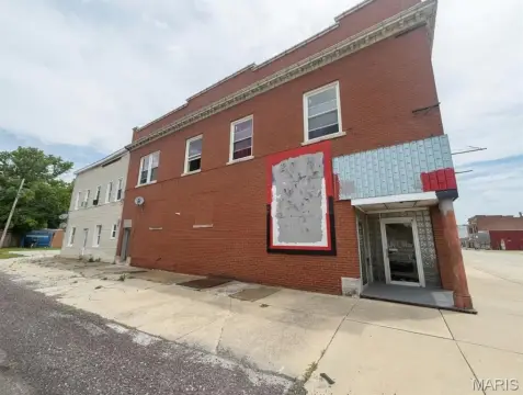 Mixed-Use Corner Building with Retail