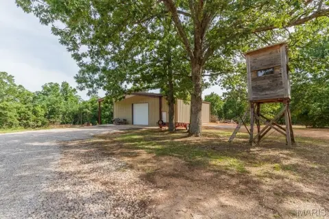 Heavily Wooded Hunting Tract with Shop