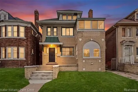 Brick Duplex with Enclosed Sun Porches