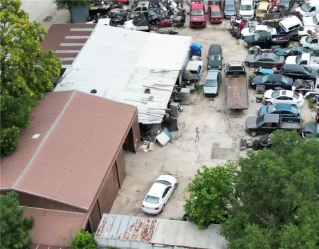 Fenced Auto Repair and Salvage Yard