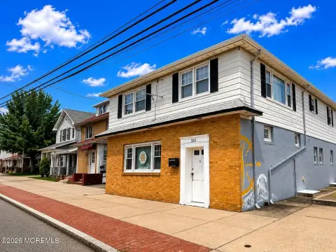 Mixed-Use Building with Studio Apartment