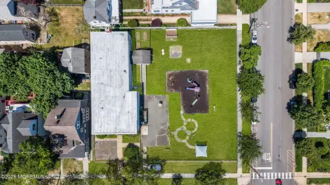 Corner Development Lot with Existing Building