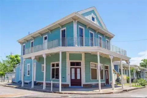 Historic Corner Building with Balcony