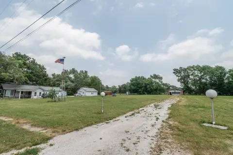 Land with Shop Building