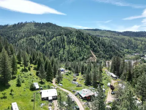 Acreage with Level and Hillside Terrain