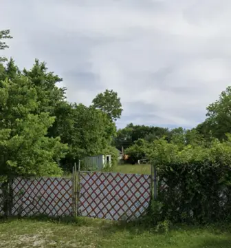 Fenced Parking Lot With Office
