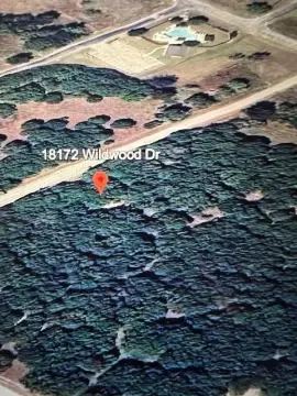 Heavily Wooded Lot in Resort