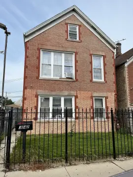 Brick Duplex With Garage