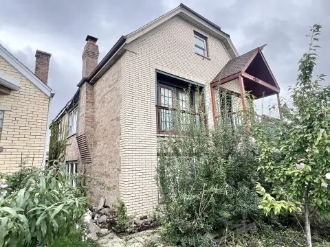 Brick Duplex with Expandable Attic