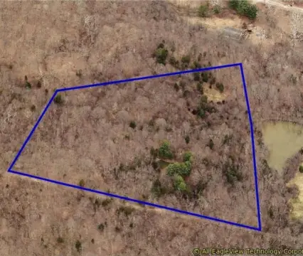 Amesville Wooded Land with Pond