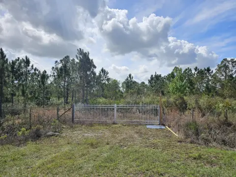 Okeechobee Acreage with Improvements