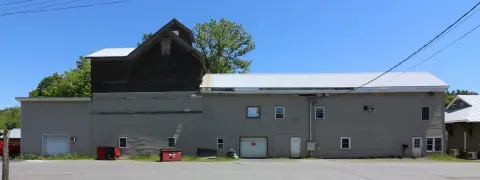 Two-Story Flex Space with Garage Doors